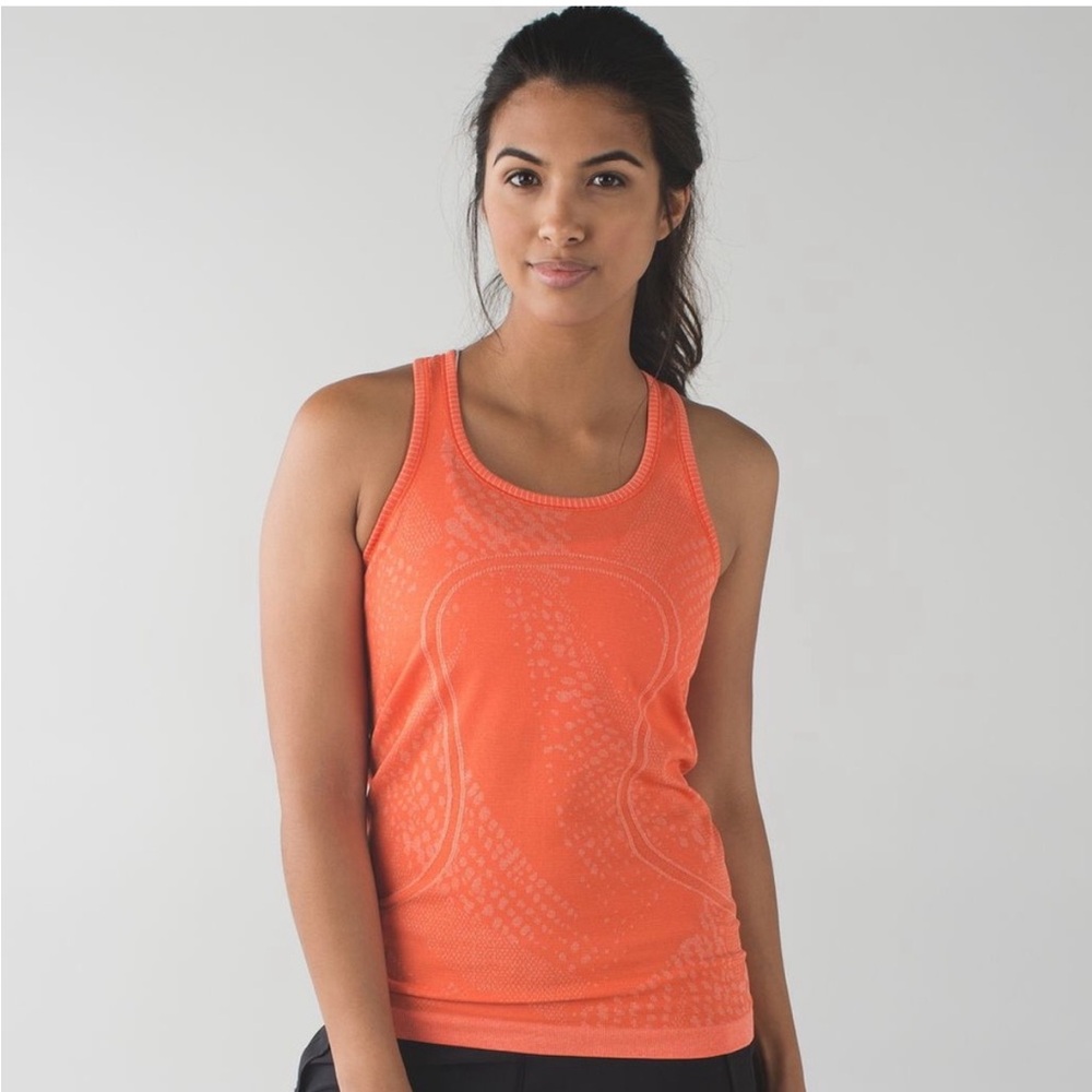 Lululemon Swiftly Tech Racerback
Heathered Duck Sauce Sz 4